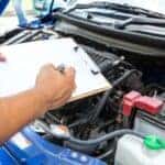 Technician performing routine maintenance