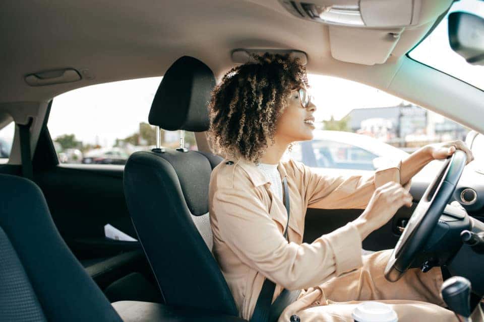 Young woman driving an SUV