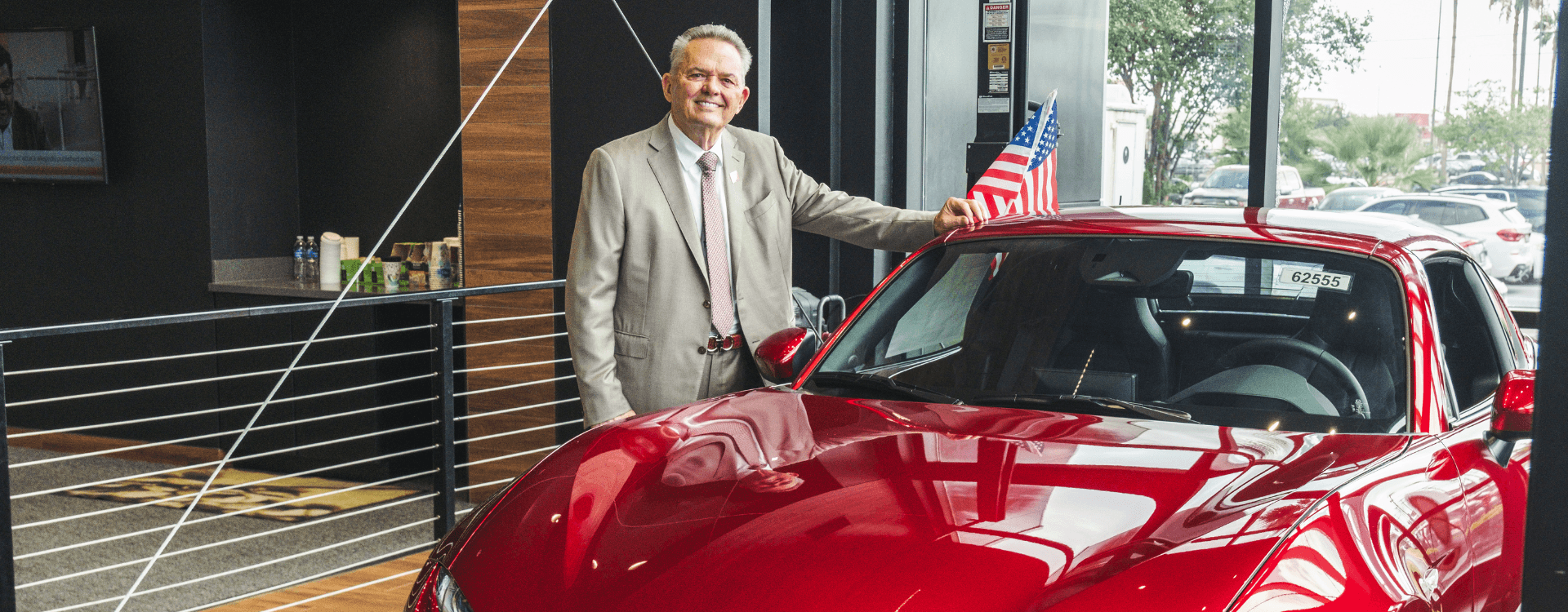 Mr Vackar with a red Mazda