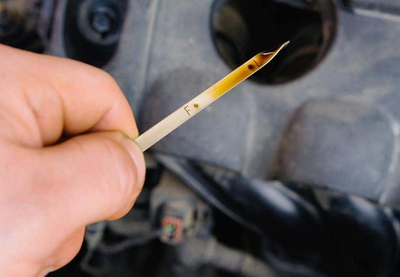 Checking Oil With Dipstick