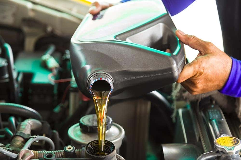 Pouring New Engine Oil