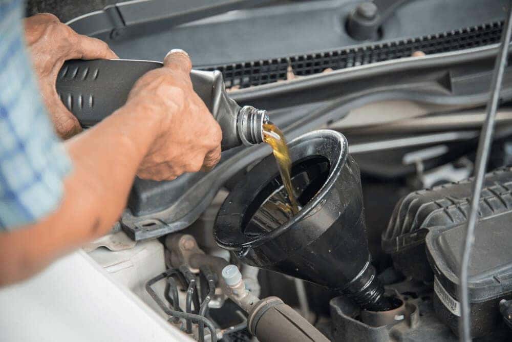 Pouring New Engine Oil
