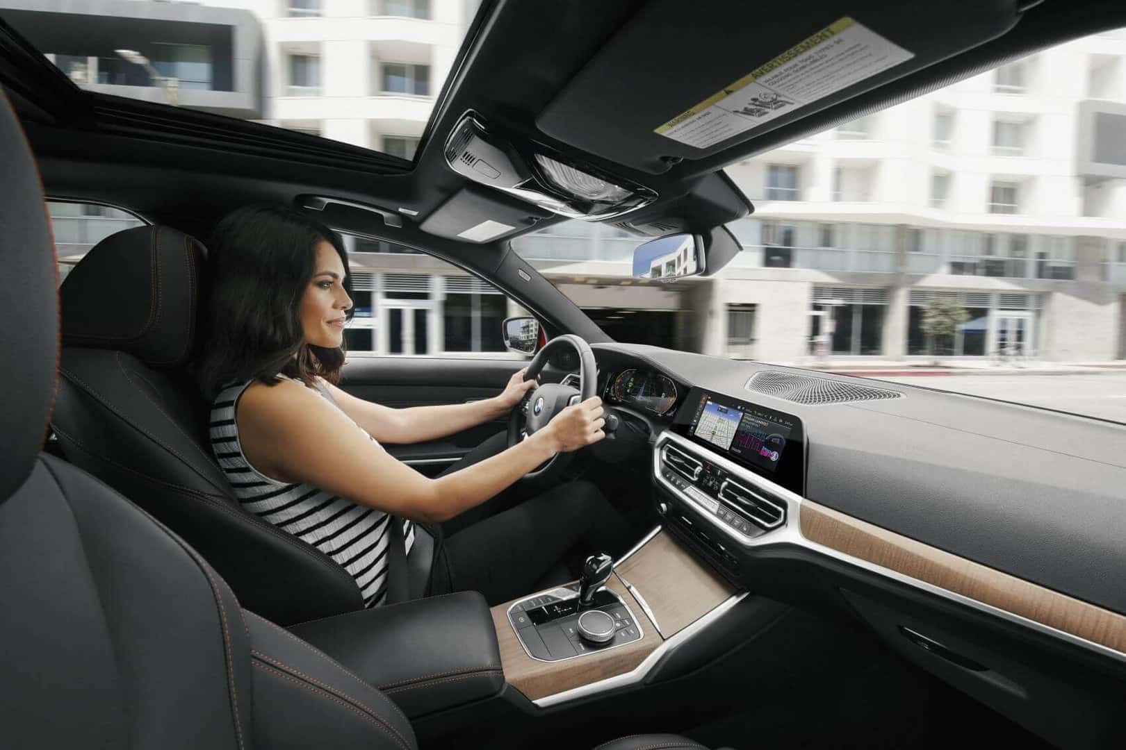 BMW 3 Series Interior with woman in driver