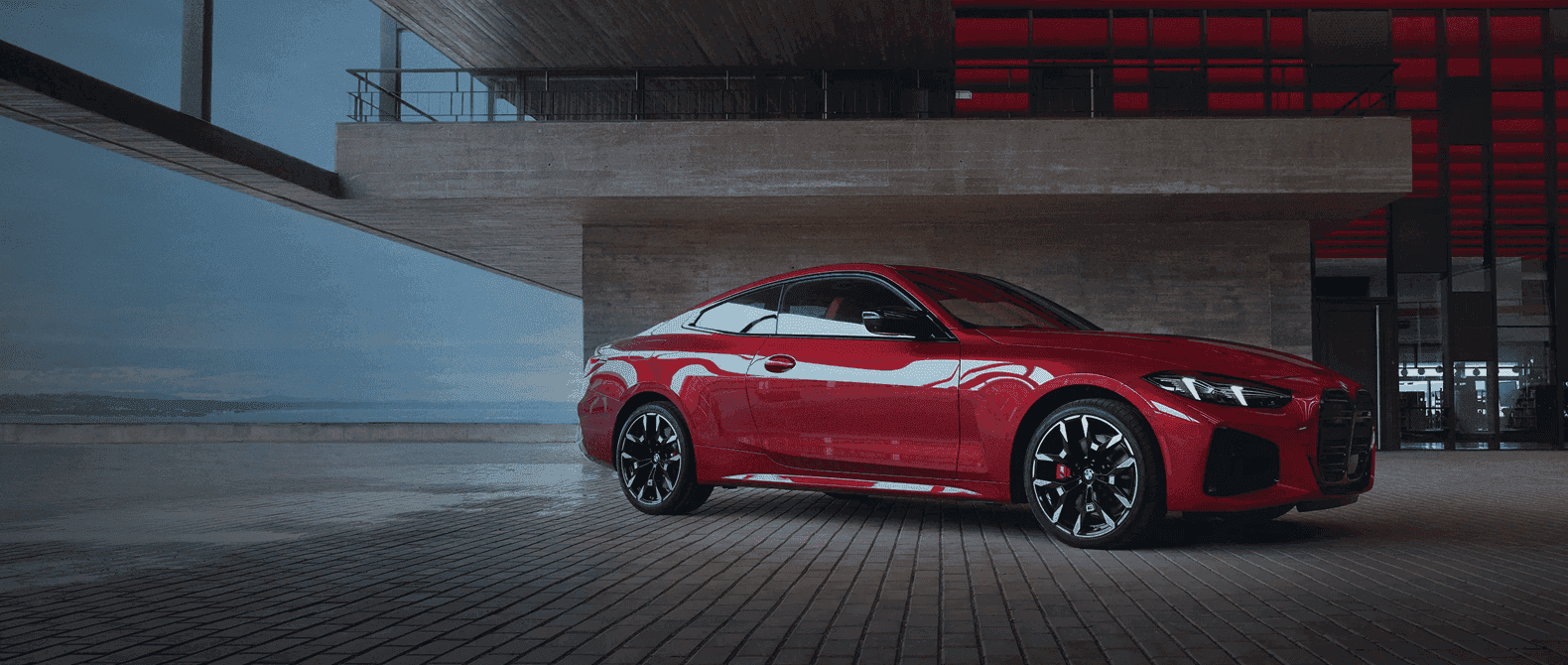 2027 BMW 4 Series Coupe parked in a showroom