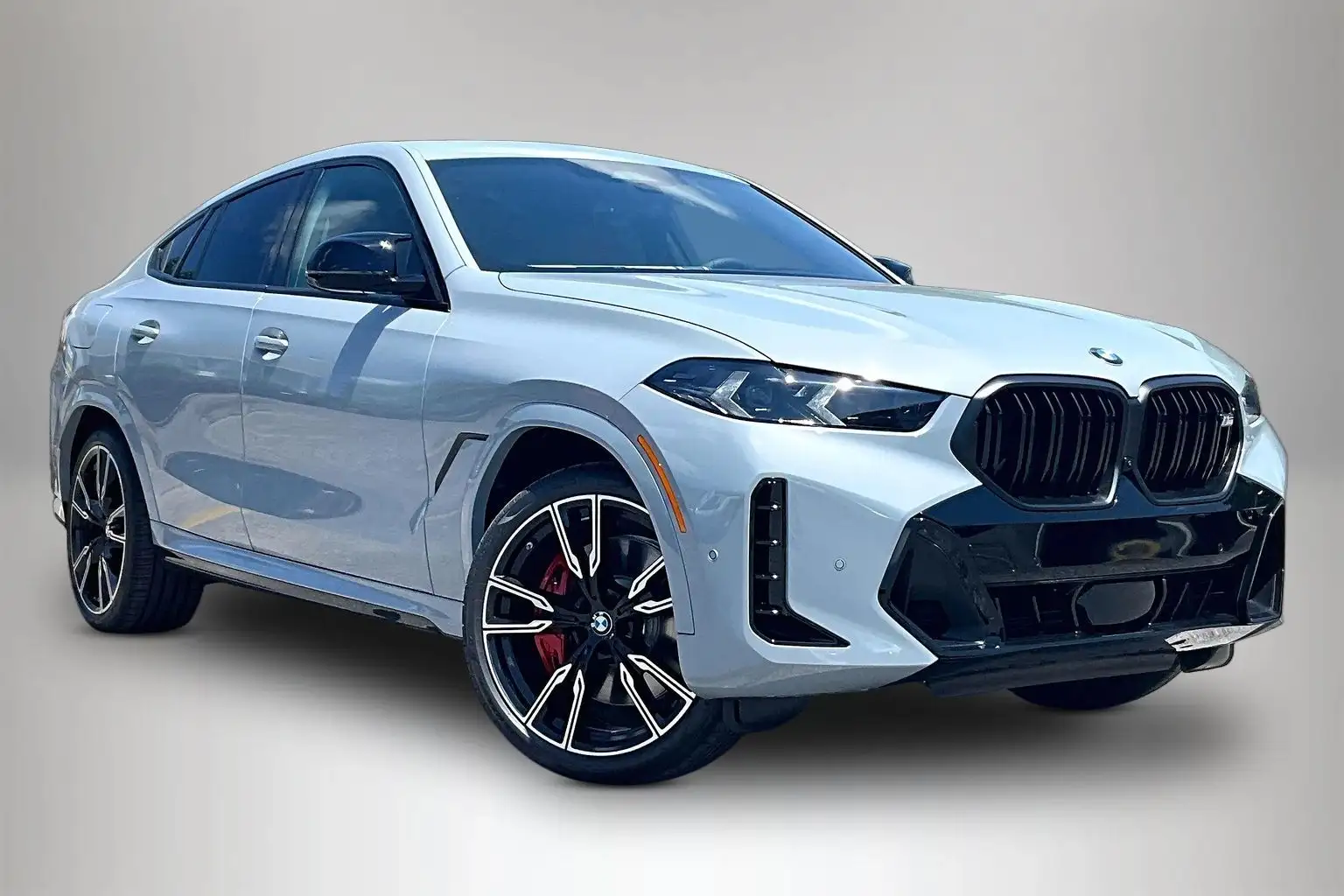 New 2027 BMW X6 M60i in stock at BMW of Fort Walton Beach — front three-quarter