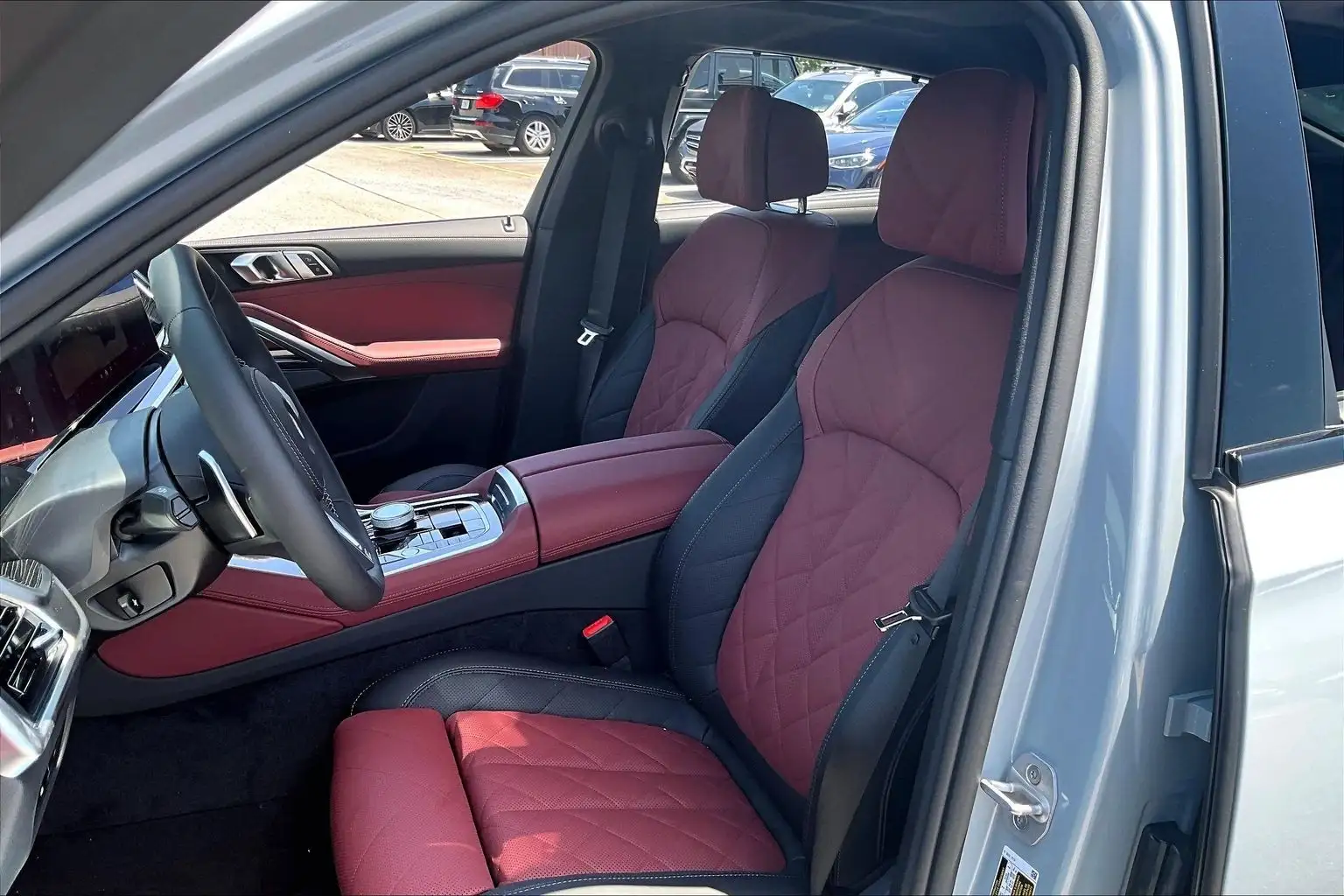 2027 BMW X6 M60i — front seats