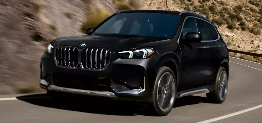2027 BMW X1 taking a corner, demonstrating Performance Control