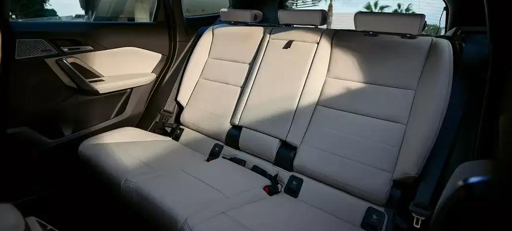 Rear seats and cargo area of the 2027 BMW X1 with Veganza upholstery