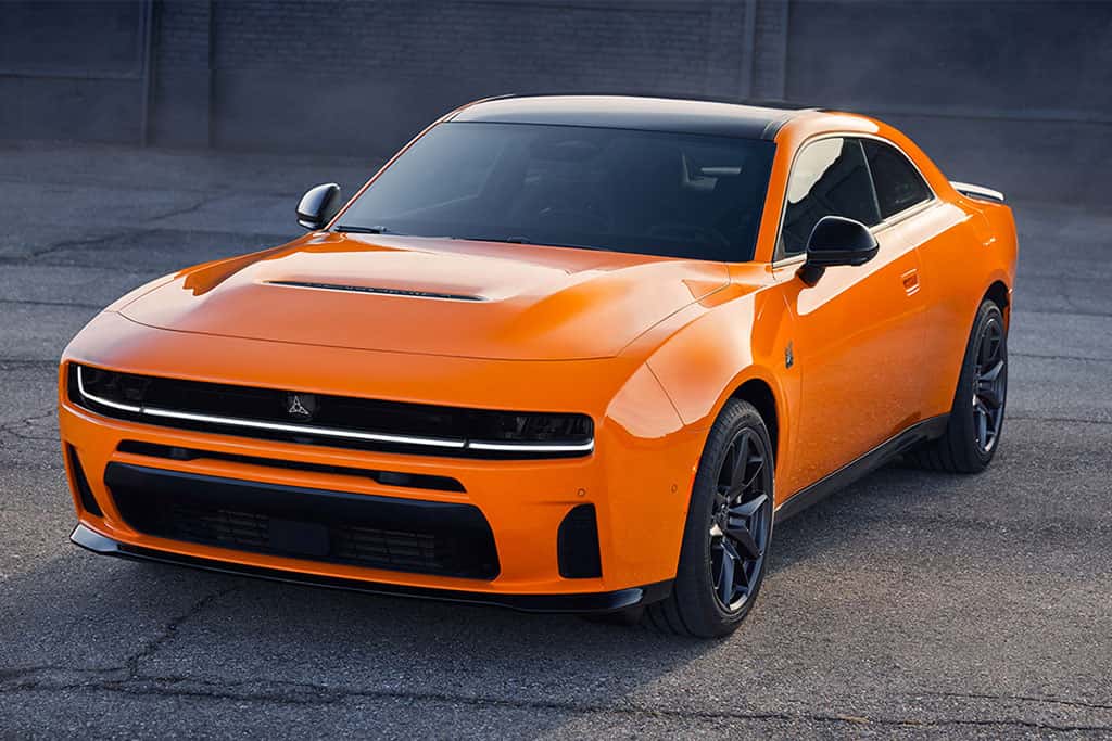 2026 Dodge Charger Scat Pack in orange parked
