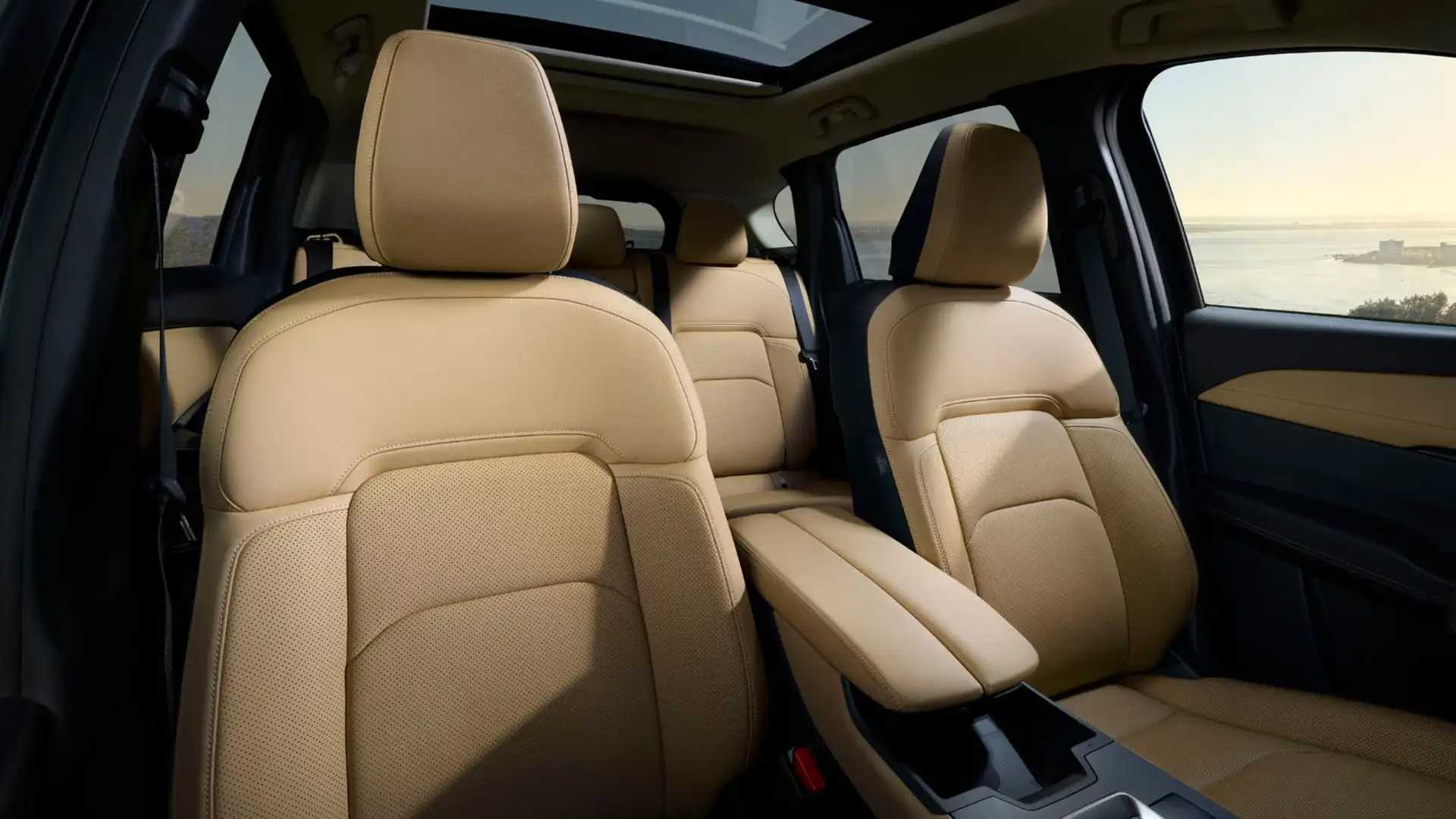 2026 Mazda CX-5 tan leather front seats with center armrest, panoramic sunroof, and bay view