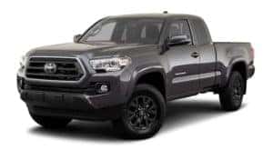 A dark grey 2020 Toyota Tacoma is facing left.