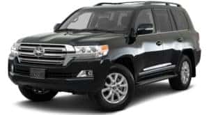 A black 2021 Toyota Land Cruiser is angled left.