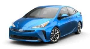A blue 2021 Toyota Prius is angled left.