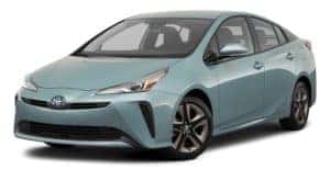 A light blue 2021 Toyota Prius is angled left.