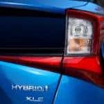 The badging on a blue 2021 Toyota Prius XLE from a Toyota Prius dealership is shown.