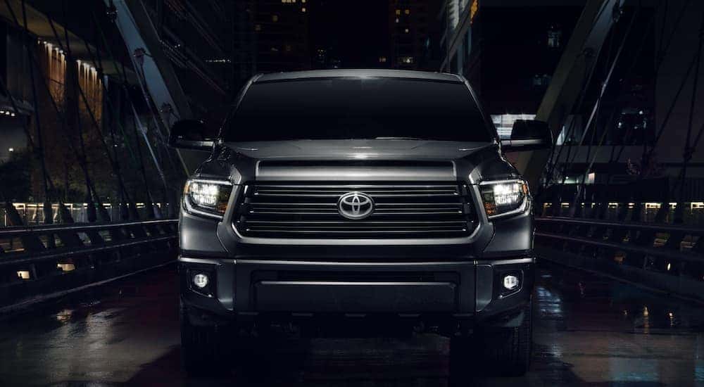 A grey 2021 Toyota Tundra is shown from the front after searching for new trucks in stock.