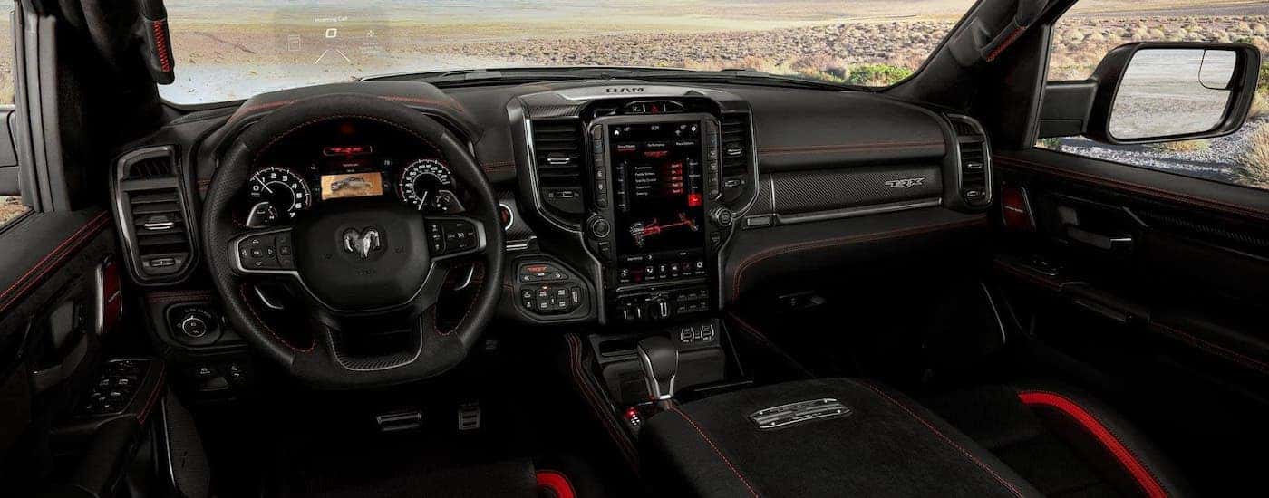 The black interior of a 2021 Ram 1500 TRX is shown.