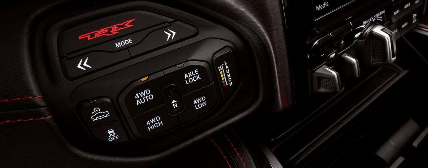 A closeup shows modes and controls in a 2021 Ram 1500 TRX.
