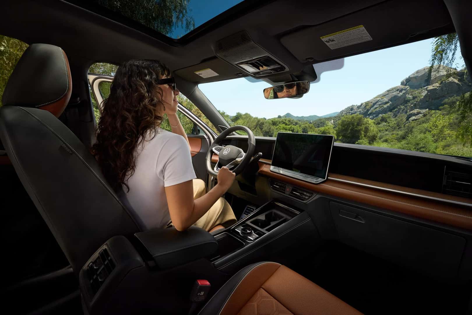 woman driving volkswagen car