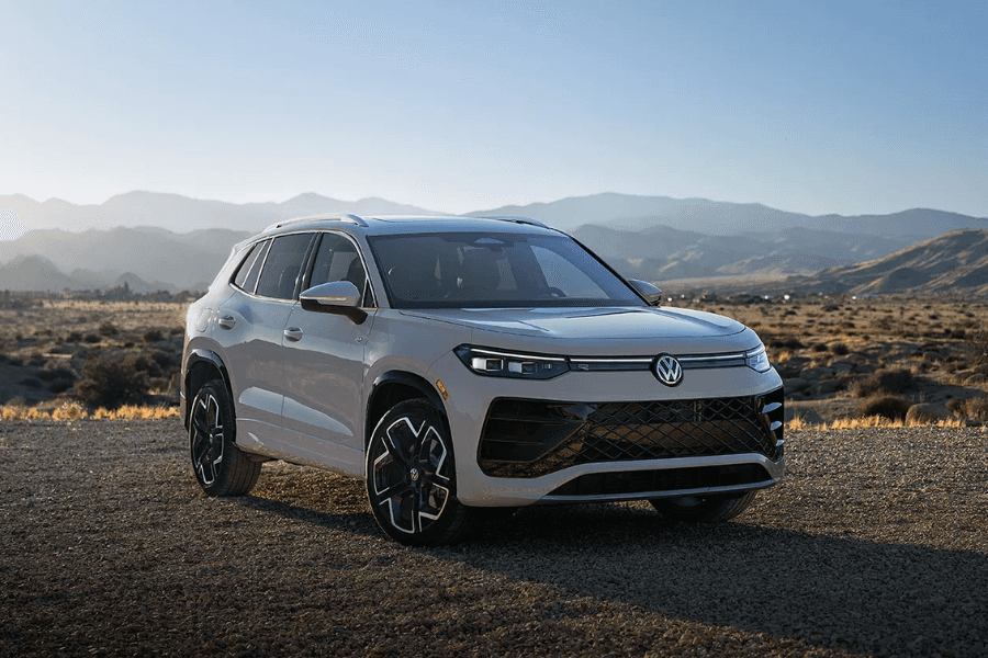 Volkswagen Tiguan parked with a city backdrop.
