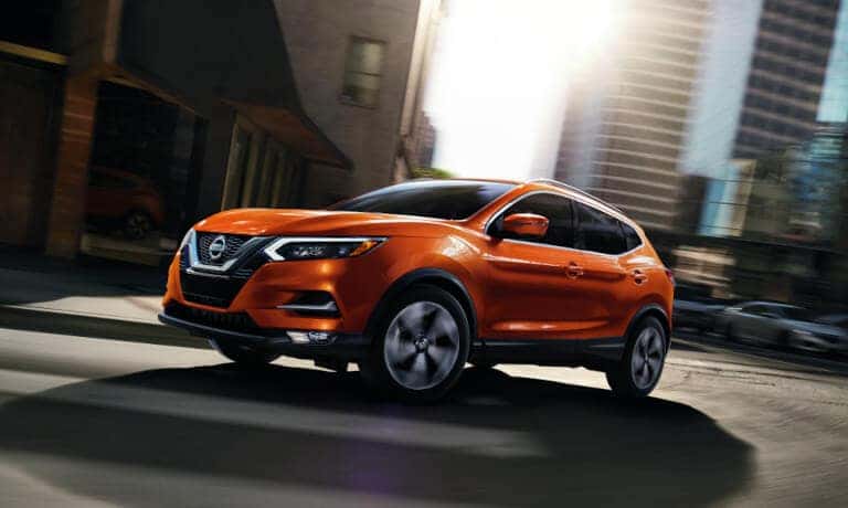 2022 Nissan Rogue Sport taking a turn in the city