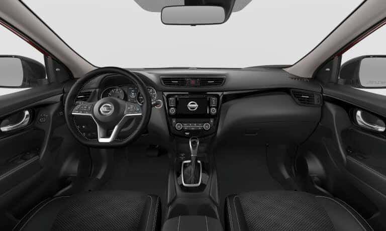 2022 Nissan Rogue Sport interior front seating and dashboard