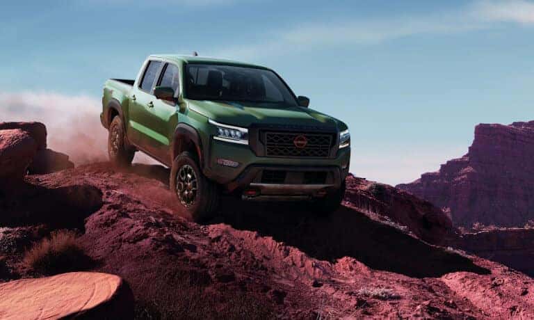 2023 Nissan Frontier offroading in rocky desert