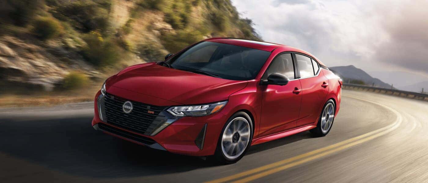 2025 Nissan Sentra Exterior Driving On Mountain Curve