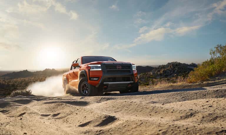 2025 Nissan Frontier Exterior Driving In Sand