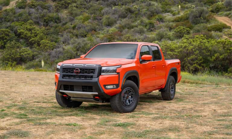 2025 Nissan Frontier Exterior Parked By Grassy Hill