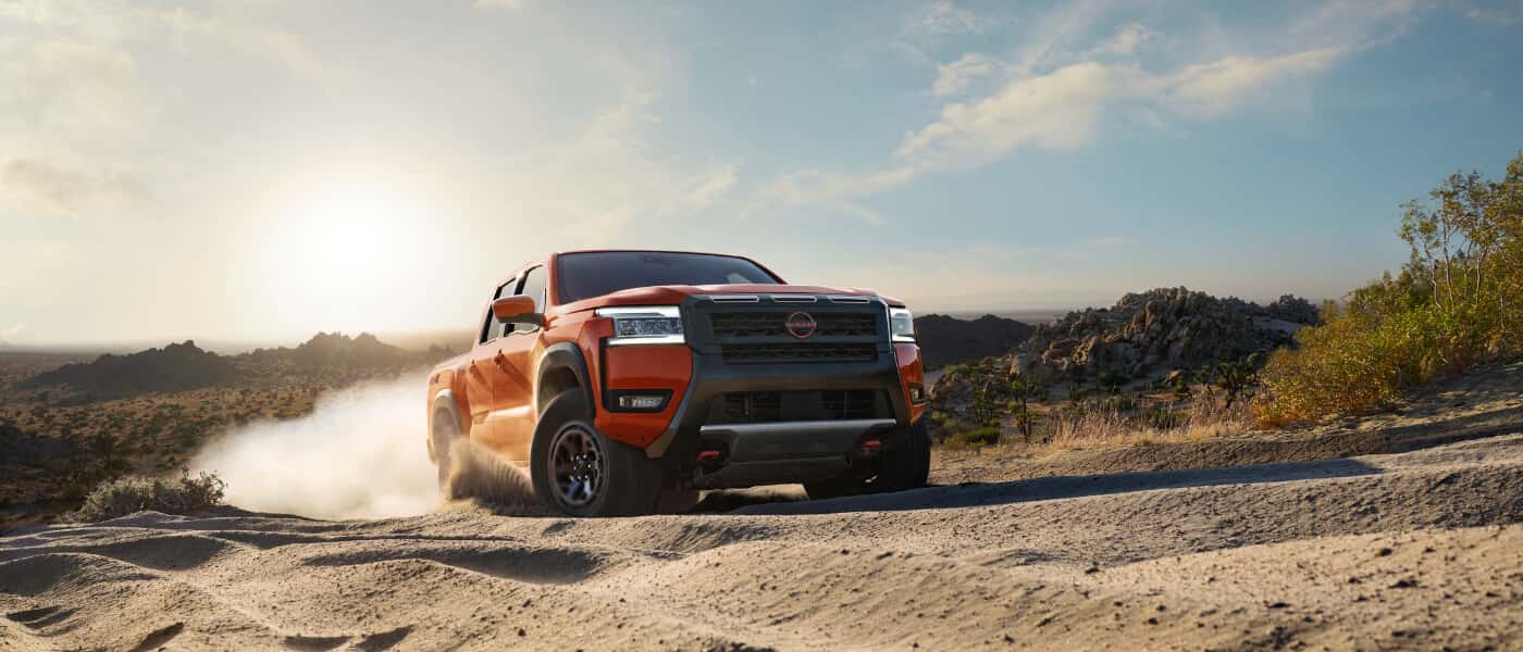 2025 Nissan Frontier Exterior Driving In Sand