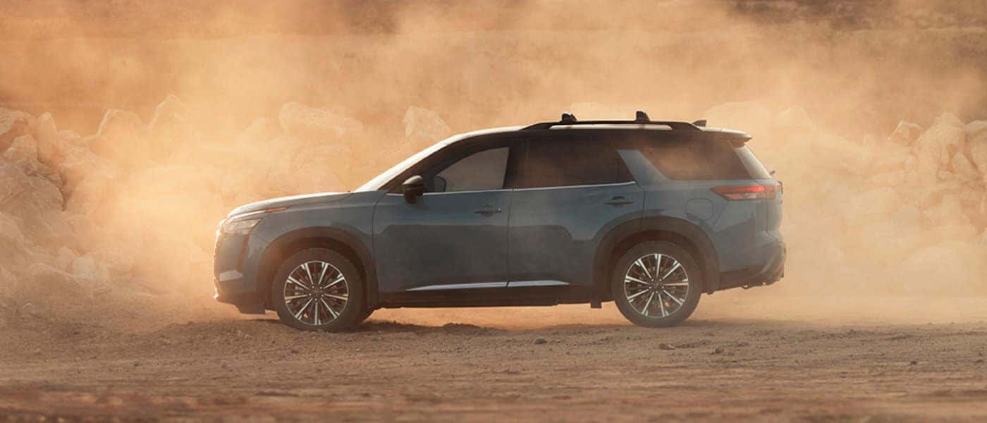 2026 Nissan Pathfinder Exterior Driving Through Dust