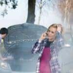 Couple dealing with an overheating engine