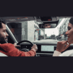 Couple driving in a Hyundai vehicle