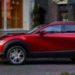 Mazda CX-30 Parked Curbside in Front of Stores