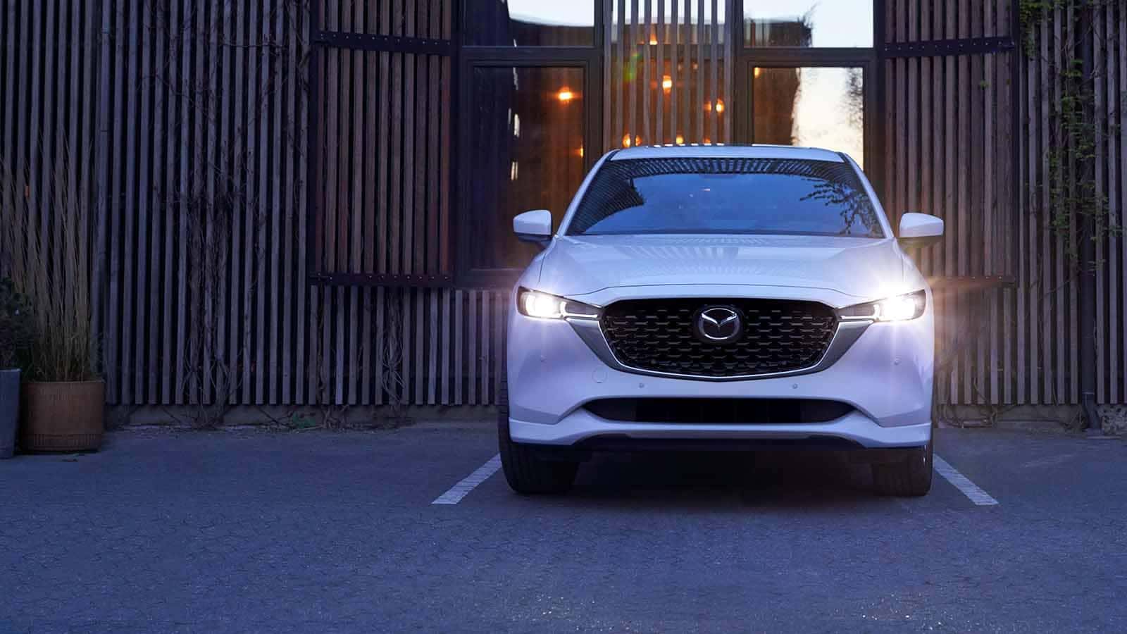 White 2022 Mazda CX-5 Compact Crossover SUV Driving in city