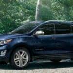 Blue 2020 Chevy Equinox in woods