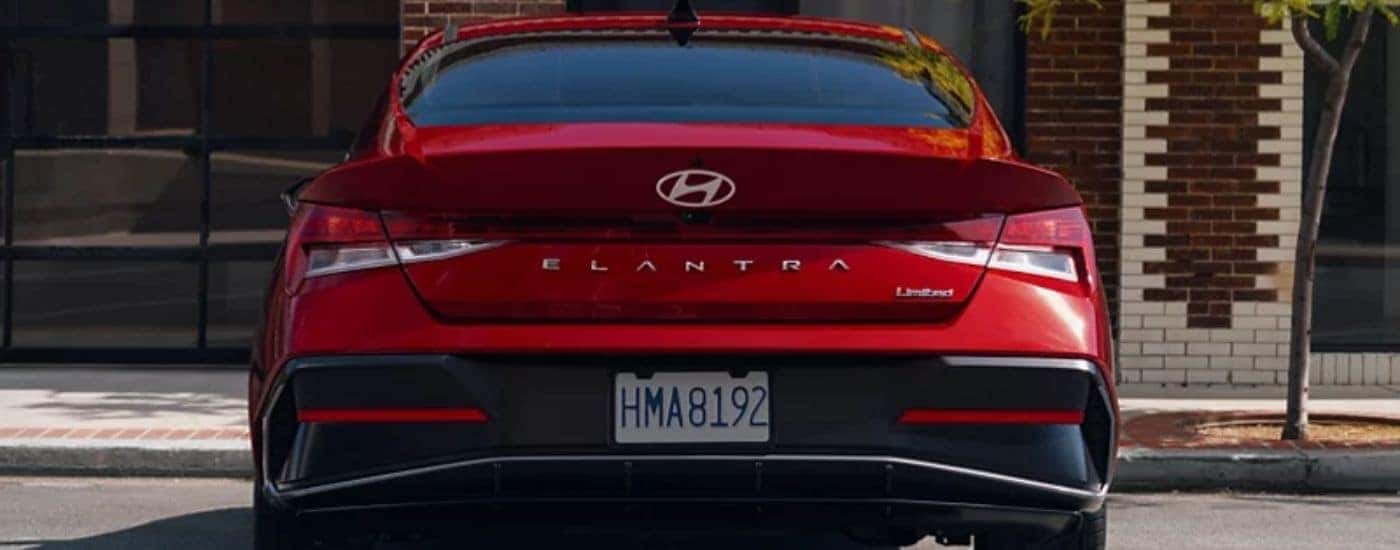 Red 2026 Hyundai Elantra Limited from the rear.