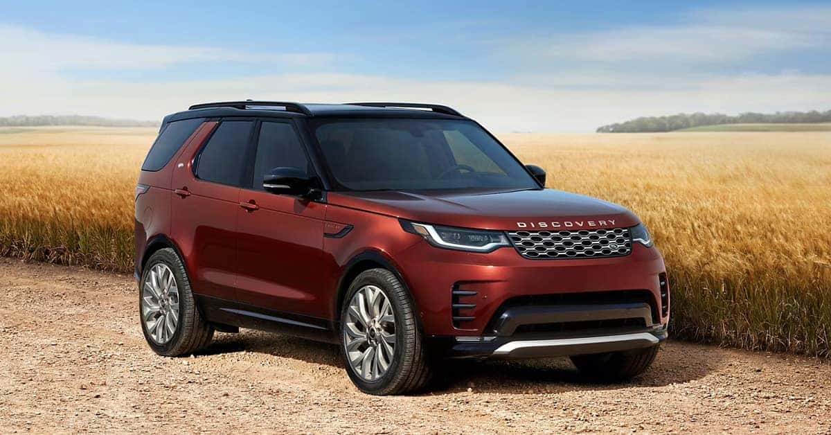 A 2026 Land Rover Discovery parked near a ricefield