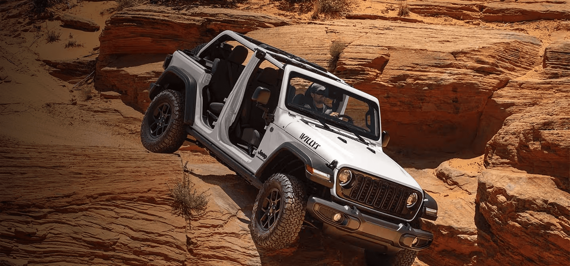 2026 Jeep Wrangler conquering rocky terrain