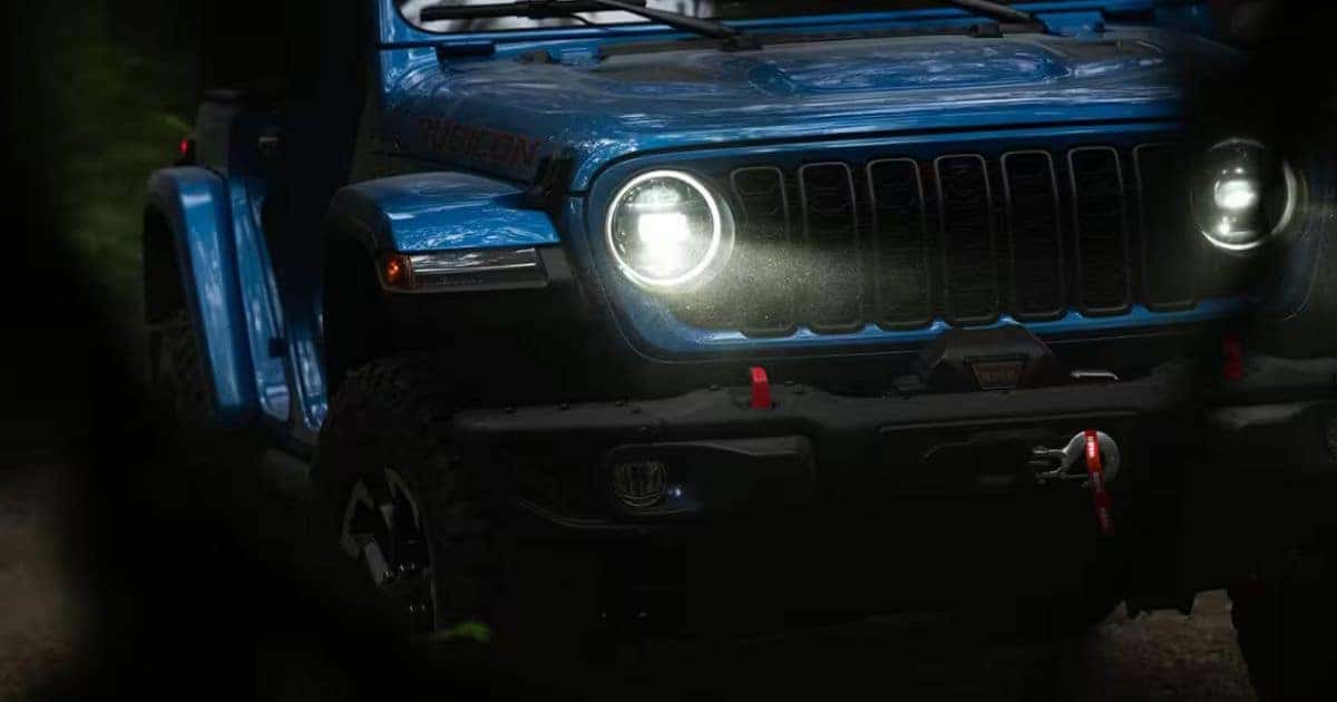 The 2026 Jeep Wrangler uses round headlights with LED technology for better visibility.