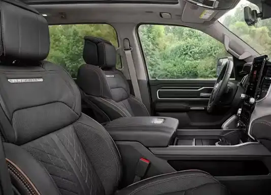 Black quilted leather front bucket seats and center console in the RAM 1500 Tungsten