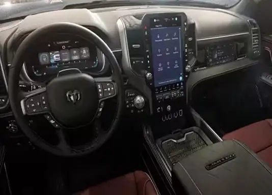 RAM 1500 Limited dashboard and vertical touchscreen with burgundy leather seats