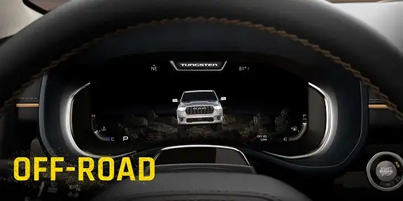 RAM digital cluster display showing the truck graphic with Off-Road drive mode selected