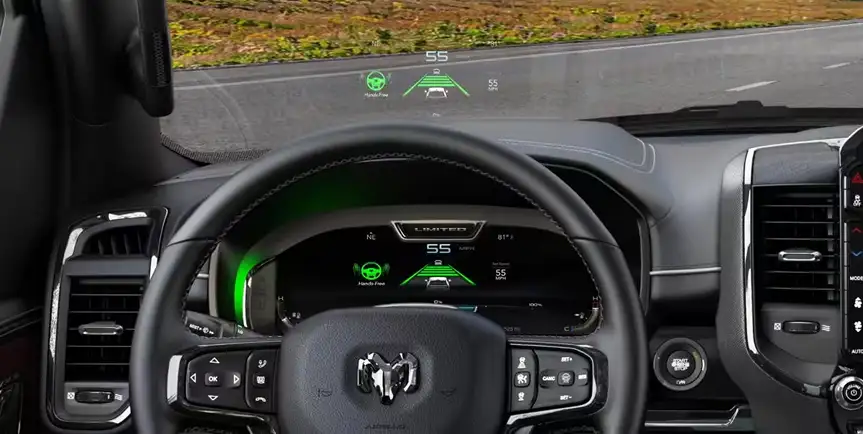 Head-Up Display projecting green speed and lane graphics onto the RAM 1500 windshield