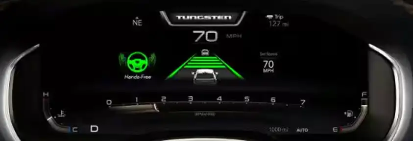 RAM digital cluster showing the green hands-free lane-centering graphic at 70 mph