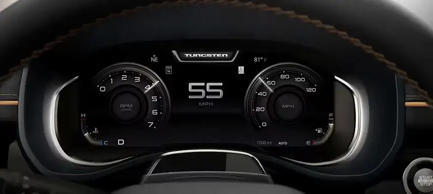 RAM digital cluster displaying a 55 mph speed limit sign reading between the gauges