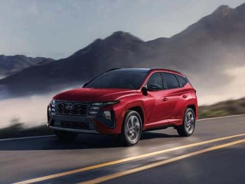 2025 Hyundai TUCSON Hybrid driving on a highway
