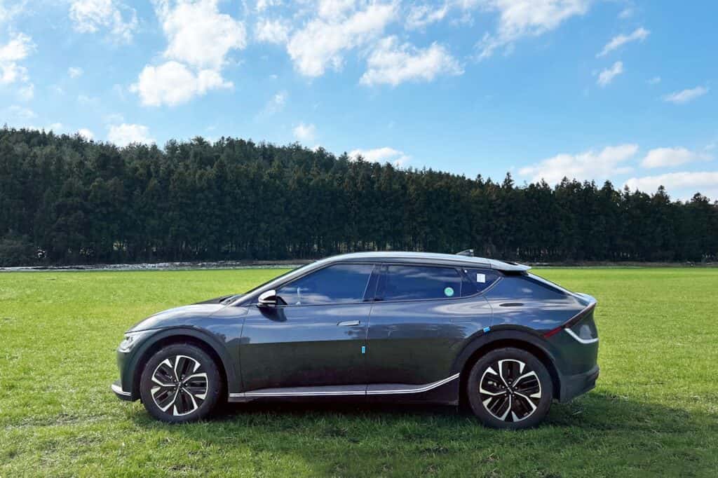 Kia EV6 Parked on Green Grass Field