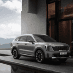 a silver car parked in front of a building
